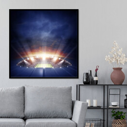 Plakat w ramie Oświetlony stadion pod granatowym niebem