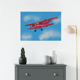 Plakat samoprzylepny Czerwony samolot lecący po błękitnym niebie