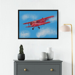 Obraz w ramie Czerwony samolot lecący po błękitnym niebie