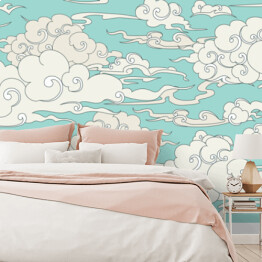 Fototapeta Malowane jasne chmury na niebieskim niebie 