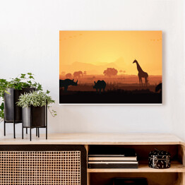 Obraz na płótnie Zwierzęta Afryki na tle zachodzącego słońca