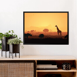 Obraz w ramie Zwierzęta Afryki na tle zachodzącego słońca