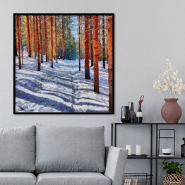 Plakat w ramie Ścieżka prowadząca przez las pokryta śniegiem