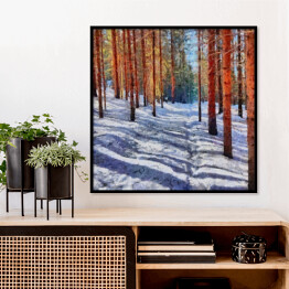 Plakat w ramie Ścieżka prowadząca przez las pokryta śniegiem