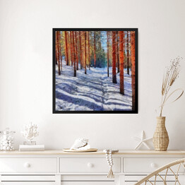 Obraz w ramie Ścieżka prowadząca przez las pokryta śniegiem