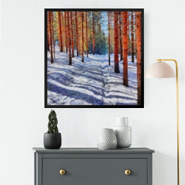 Obraz w ramie Ścieżka prowadząca przez las pokryta śniegiem