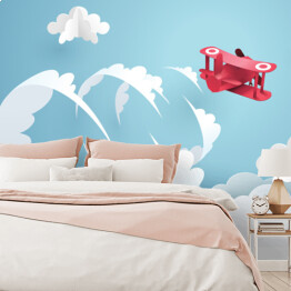 Fototapeta winylowa zmywalna Czerwony samolot wykonujący akrobacje na niebie