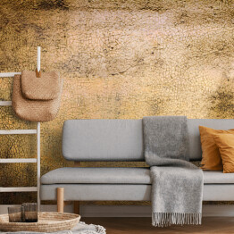 Fototapeta samoprzylepna Granatowa betonowa ściana pokryta złotym pyłem
