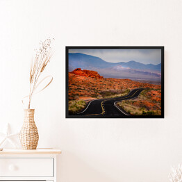 Obraz w ramie Otwarta droga w czerwonym skalistym pustynnym terenie 