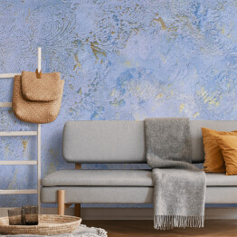 Fototapeta samoprzylepna Niebieska ściana ze złotymi połyskującymi dekoracjami