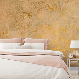 Fototapeta Ściana w kolorze cielistym ze złotymi lśniącymi zdobieniami