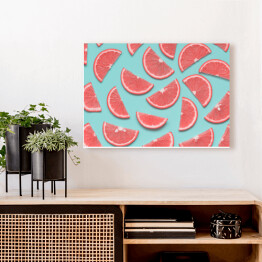 Obraz na płótnie Plastry różowych pokrojonych owoców tropikalnych - kompozycja otwarta
