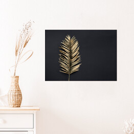Plakat Liść palmy w złotym kolorze na ciemnym tle