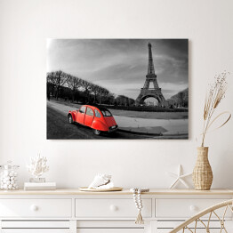 Obraz na płótnie Wieża Eiffla i czerwony samochód w Paryżu