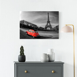 Obraz na płótnie Wieża Eiffla i czerwony samochód w Paryżu