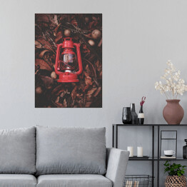 Plakat Czerwona latarenka na jesiennych liściach