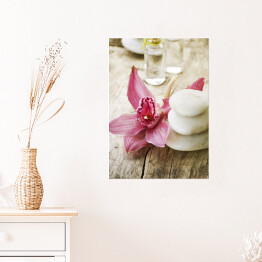 Plakat samoprzylepny Jasne kamienie do masażu i różowy piękny kwiat