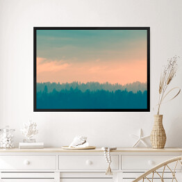 Obraz w ramie Kolorowe niebo nad lasem we mgle