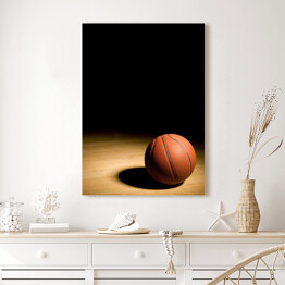 Obraz na płótnie Piłka do koszykówki na drewnianym parkiecie