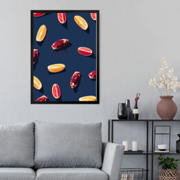 Obraz w ramie Cząstki owoców granatu i pomarańczy