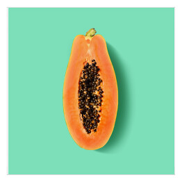Plakat samoprzylepny Przekrojona papaya na miętowym tle