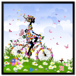 Plakat w ramie Dziewczyna na rowerze na łące latem