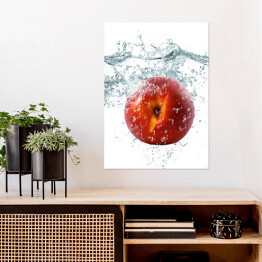 Plakat samoprzylepny Jabłko wpadające do wody
