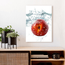 Obraz na płótnie Jabłko wpadające do wody