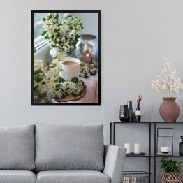 Obraz w ramie Kawa przy oknie wśród kwiatów