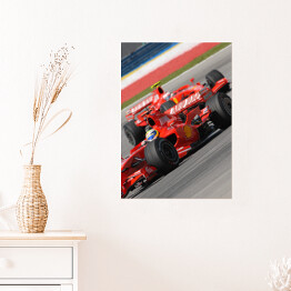 Plakat Czerwone sportowe auto Ferrari oświetlone promieniami słońca