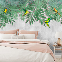 Fototapeta samoprzylepna Kolorowe papugi w wiszących liściach palmy na tle imitacji betonu