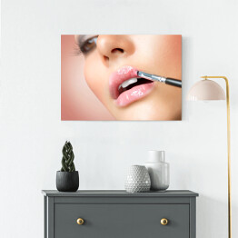 Obraz na płótnie Kobieta malująca usta