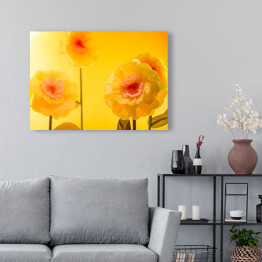Obraz na płótnie Sztuczne żółte kwiaty w słonecznym świetle
