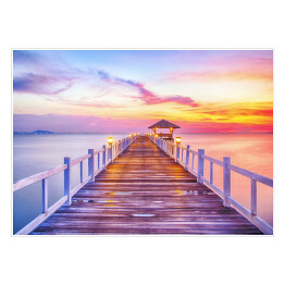Plakat samoprzylepny Pomost wychodzący w morze o zachodzie słońca