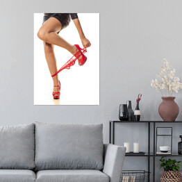 Plakat samoprzylepny Dziewczyna zdejmująca czerwoną bieliznę na białym tle
