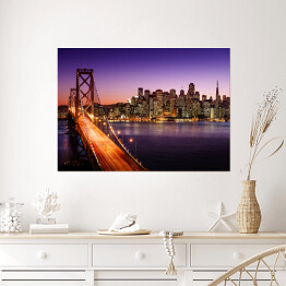 Plakat samoprzylepny Oświetlony most Bay Bridge w San Francisco podczas zachodu słońca