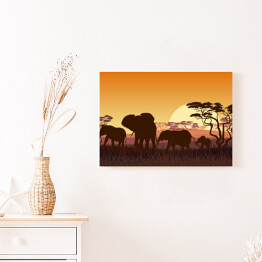 Obraz na płótnie Rodzina słoni na sawannie - Afryka o zachodzie słońca
