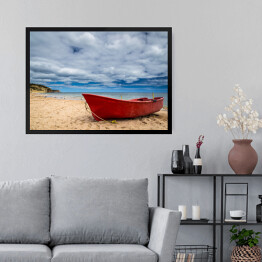 Obraz w ramie Czerwona łódź na plaży
