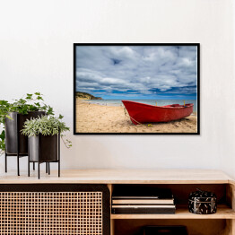 Plakat w ramie Czerwona łódź na plaży