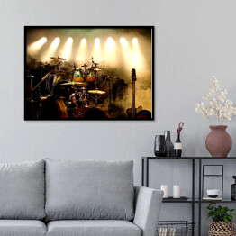Plakat w ramie Instrumenty muzyczne na scenie oświetlone światłami scenicznymi