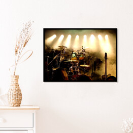 Plakat w ramie Instrumenty muzyczne na scenie oświetlone światłami scenicznymi