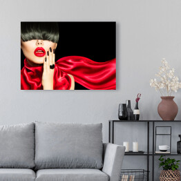 Obraz na płótnie Kobieta z modną fryzurą, makijażem i manicure w czerwonym ubraniu