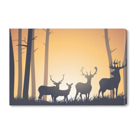 Obraz na płótnie Dzikie zwierzęta w lesie na tle zachodzącego słońca