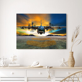 Obraz na płótnie Lądowanie samolotu wojskowego na tle płomiennego nieba