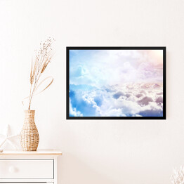 Obraz w ramie Ponad pastelowymi chmurami