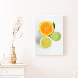 Obraz na płótnie Przekrojone cytryna, limonka i pomarańcza