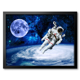 Obraz w ramie Astronauta na tle przestrzeni kosmicznej