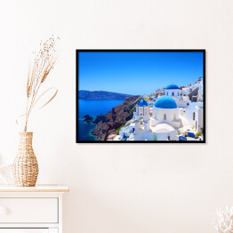 Plakat w ramie Wioska Oia w Santorini - charakterystyczny grecki krajobraz