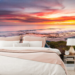 Fototapeta winylowa zmywalna Zachód słońca w odcieniu różu na pięknej plaży