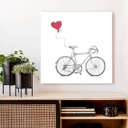 Szkic roweru z balonem w kształcie czerwonego serca